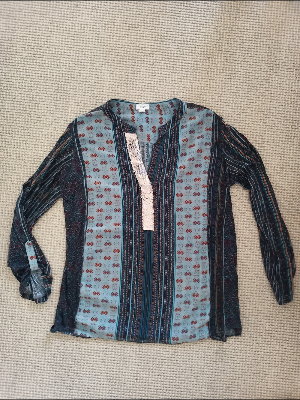 Anthropologie TINY Devas blouse. Aztec-inspired Print And Gold Neck Placket.